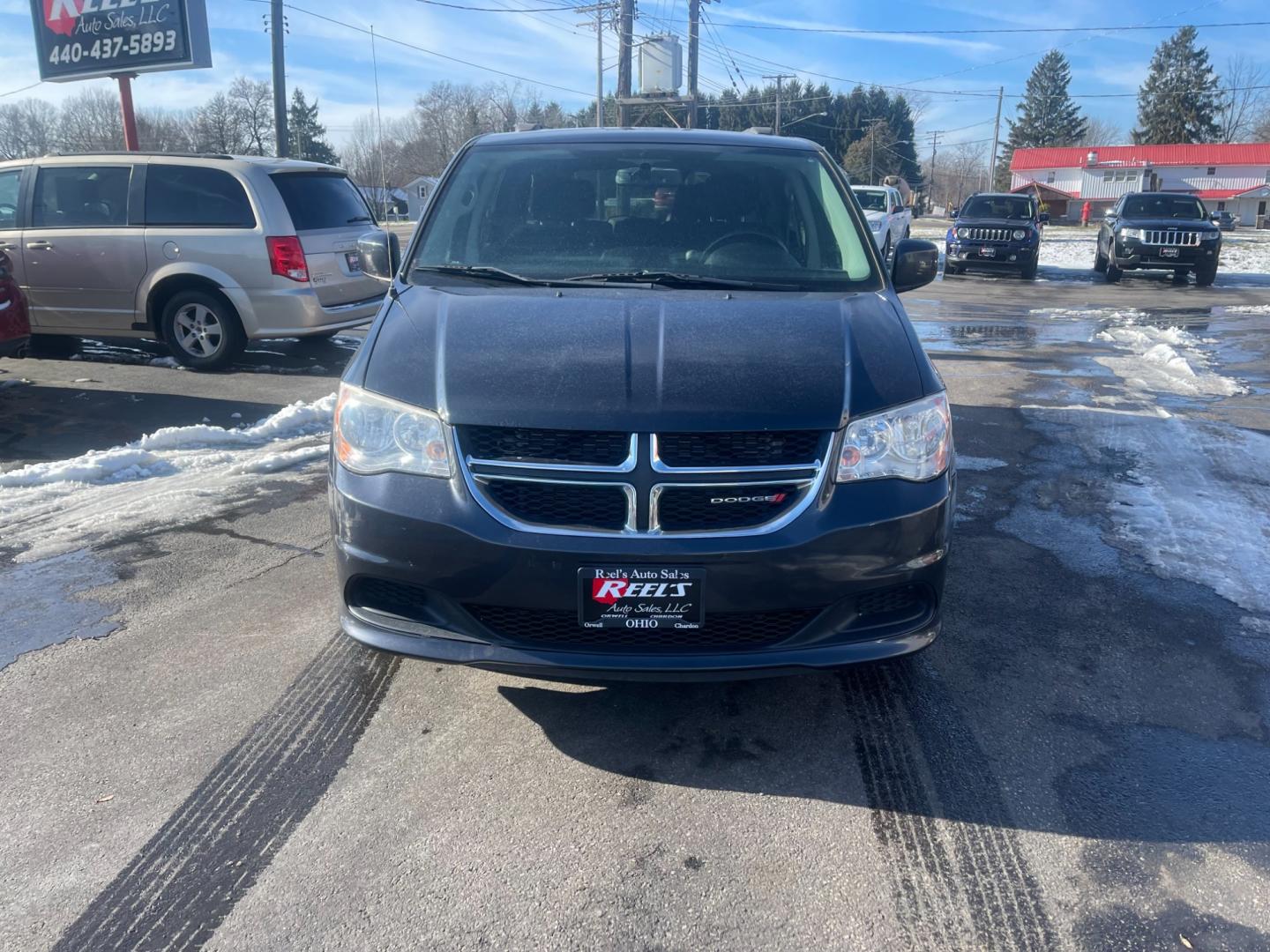 2014 Gray /Black Dodge Grand Caravan SXT (2C4RDGCG9ER) with an 3.6L V6 DOHC 24V FFV engine, 6 Speed Automatic transmission, located at 547 E. Main St., Orwell, OH, 44076, (440) 437-5893, 41.535435, -80.847855 - This 2014 Dodge Grand Caravan SXT is equipped with a rear entertainment system and STOW N GO seating, allowing for easy storage and flexibility. It also features a back-up camera, providing added convenience and safety when parking or reversing. With its versatile seating and entertainment options, - Photo#1